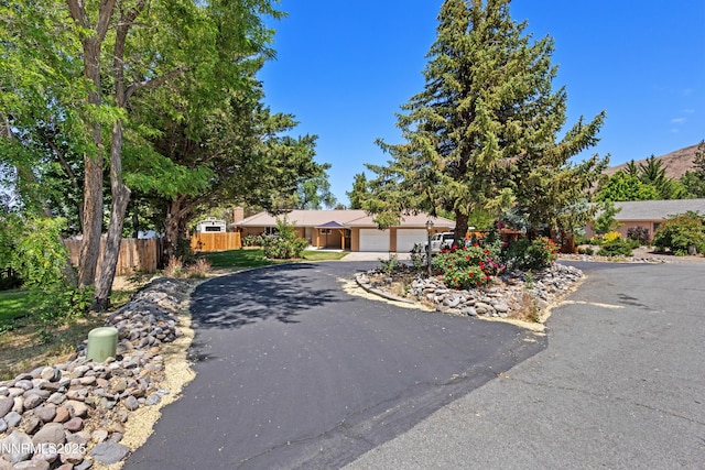 2196 Pebble Beach Dr, Reno, NV 89502 - view of front of home with driveway and an attached garage