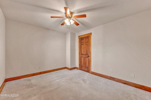 4215 Wild Eagle Ter, Reno, NV 89511 - carpeted empty room featuring a ceiling fan and baseboards
