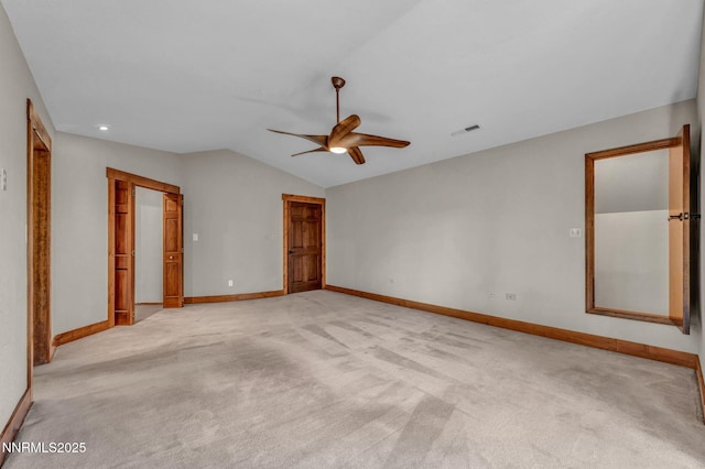 4215 Wild Eagle Ter, Reno, NV 89511 - unfurnished bedroom featuring light colored carpet, vaulted ceiling, a ceiling fan, and recessed lighting