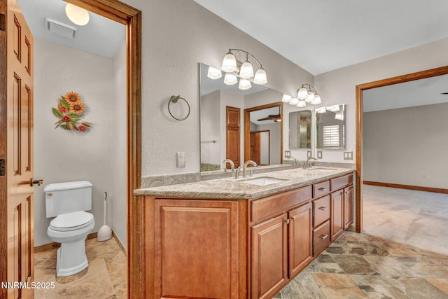 4215 Wild Eagle Ter, Reno, NV 89511 - full bath featuring double vanity and stone finish flooring
