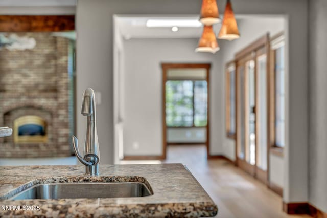 4215 Wild Eagle Ter, Reno, NV 89511 - kitchen view of stone countertops and a fireplace