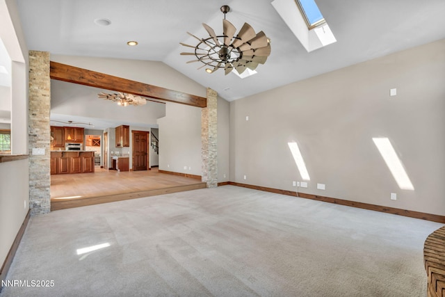 4215 Wild Eagle Ter, Reno, NV 89511 - unfurnished living room featuring a skylight, high vaulted ceiling, light carpet, and a chandelier