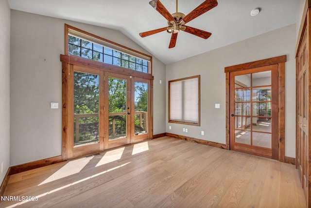 4215 Wild Eagle Ter, Reno, NV 89511 - spare room with light wood-type flooring, ceiling fan, a smoke detector, and high vaulted ceiling