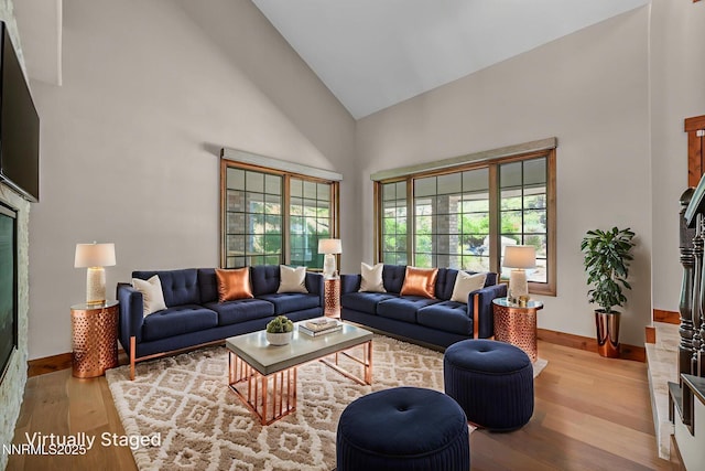 4215 Wild Eagle Ter, Reno, NV 89511 - living room with high vaulted ceiling and wood-type flooring
