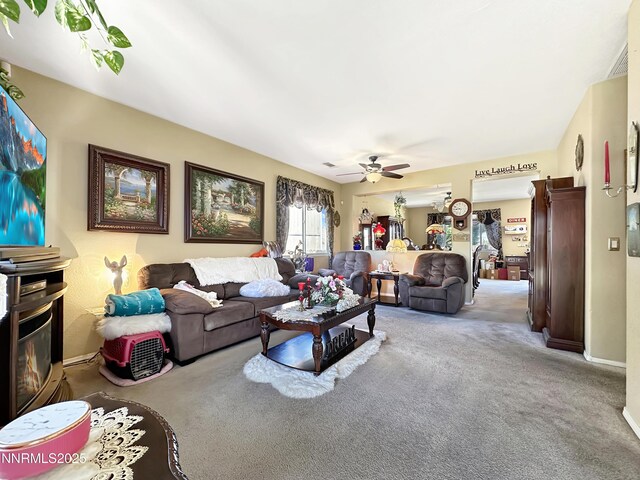 8490 Coral Reef Dr, Reno, NV 89506 - carpeted living area featuring ceiling fan