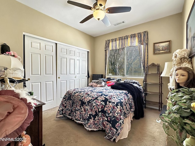 8490 Coral Reef Dr, Reno, NV 89506 - carpeted bedroom with a closet and ceiling fan