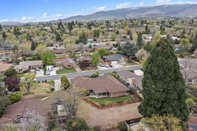 1495 Lillian Way, Reno, NV 89509 - aerial perspective of suburban area featuring a mountain backdrop