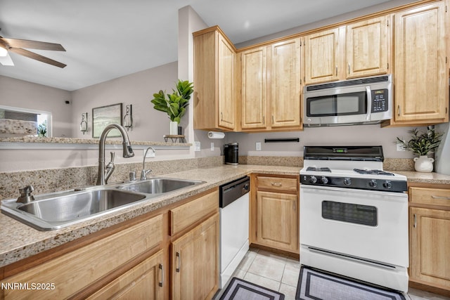 900 S Meadows Pkwy Unit 2623, Reno, NV 89521 - kitchen featuring white appliances, light brown cabinetry, and a sink