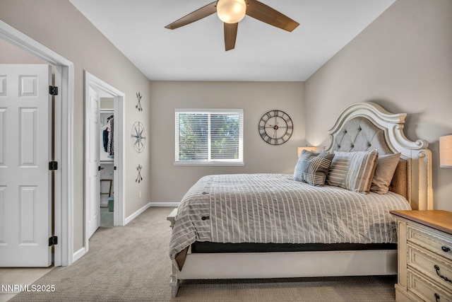 900 S Meadows Pkwy Unit 2623, Reno, NV 89521 - bedroom featuring light carpet, baseboards, a ceiling fan, and a walk in closet