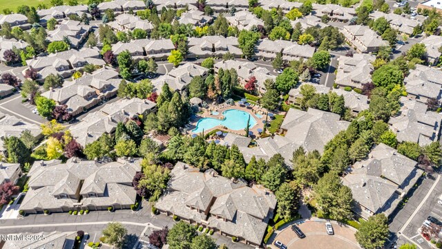 900 S Meadows Pkwy Unit 2623, Reno, NV 89521 - aerial view of property and surrounding area with nearby suburban area and a pool