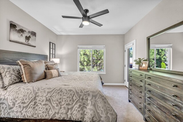 900 S Meadows Pkwy Unit 2623, Reno, NV 89521 - bedroom with carpet floors, multiple windows, baseboards, and a ceiling fan
