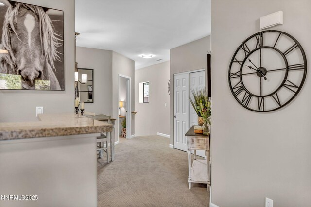 900 S Meadows Pkwy Unit 2623, Reno, NV 89521 - entryway with light colored carpet and baseboards