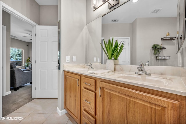 900 S Meadows Pkwy Unit 2623, Reno, NV 89521 - full bathroom with double vanity, ensuite bathroom, tile patterned flooring, and baseboards