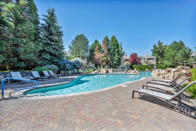 900 S Meadows Pkwy Unit 2623, Reno, NV 89521 - community pool with a patio area