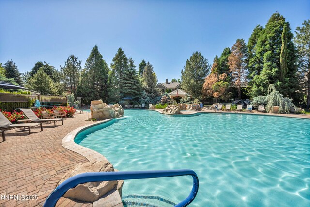 900 S Meadows Pkwy Unit 2623, Reno, NV 89521 - community pool with a patio area