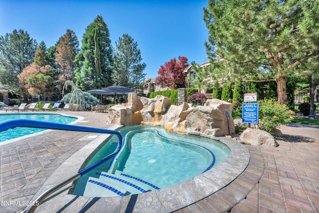 900 S Meadows Pkwy Unit 2623, Reno, NV 89521 - community pool with a patio area