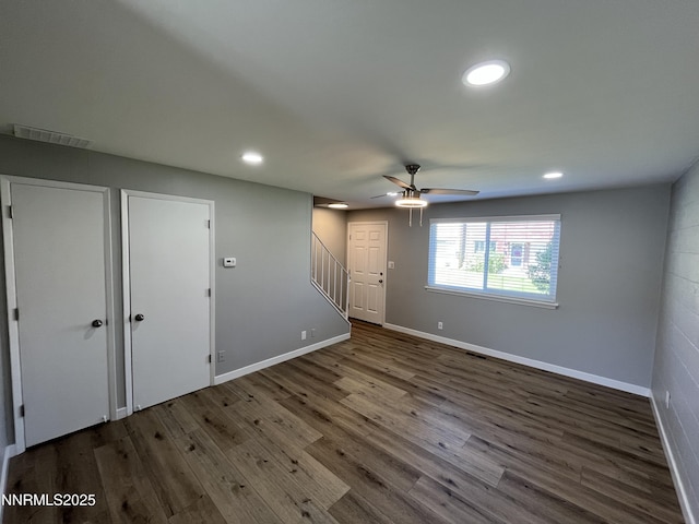 1140 S Curry St, Carson City, NV 89703 - empty room with stairway, a ceiling fan, wood finished floors, recessed lighting, and baseboards