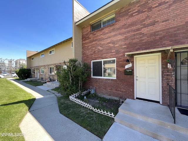 1140 S Curry St, Carson City, NV 89703 - entrance to property with brick siding