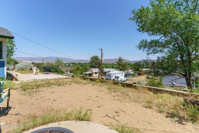 8725 Paloma Way, Reno, NV 89506 - view of yard featuring a mountain view