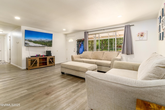 8725 Paloma Way, Reno, NV 89506 - living room with light wood-style flooring, recessed lighting, and baseboards