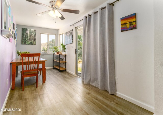 8725 Paloma Way, Reno, NV 89506 - dining space featuring light wood finished floors, a ceiling fan, and baseboards
