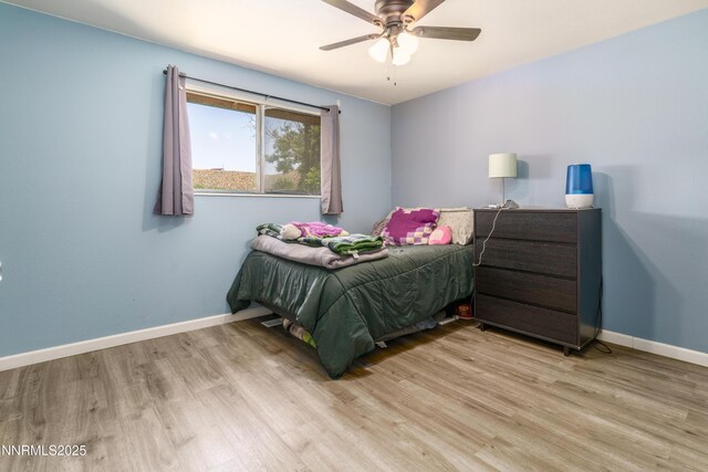 8725 Paloma Way, Reno, NV 89506 - bedroom featuring light wood-style flooring, baseboards, and ceiling fan