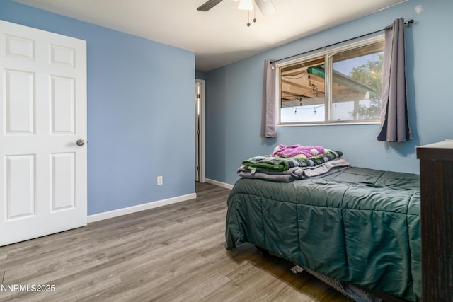 8725 Paloma Way, Reno, NV 89506 - bedroom featuring light wood-style floors, baseboards, and a ceiling fan