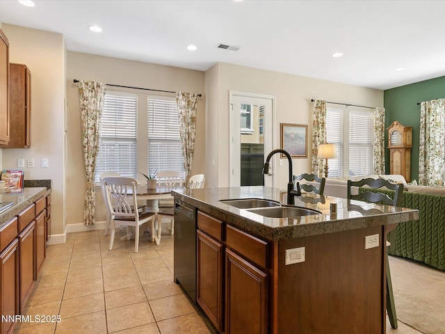 7693 Stone Bluff Way, Reno, NV 89523 - kitchen with a sink, dishwashing machine, recessed lighting, a kitchen island with sink, and a breakfast bar