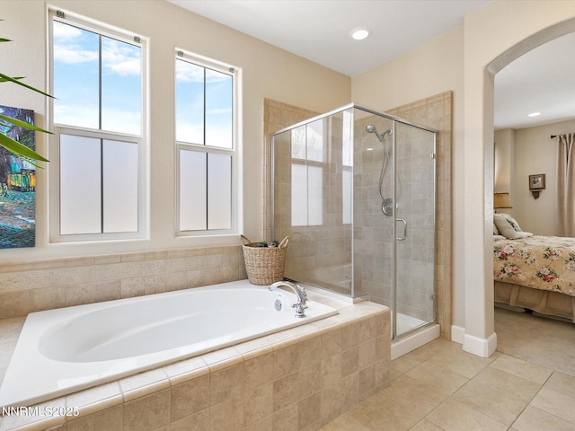 7693 Stone Bluff Way, Reno, NV 89523 - bathroom featuring a garden tub, a shower stall, tile patterned floors, ensuite bathroom, and recessed lighting