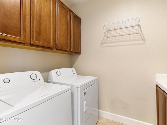 7693 Stone Bluff Way, Reno, NV 89523 - laundry area with independent washer and dryer, cabinet space, and baseboards