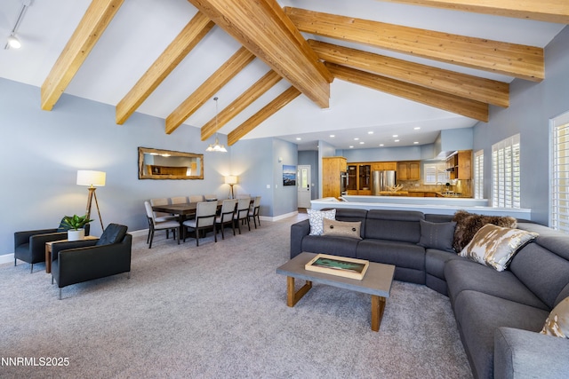 1314 Saint Gallen Ct, Incline Village, NV 89451 - carpeted living area with beamed ceiling, baseboards, track lighting, high vaulted ceiling, and recessed lighting