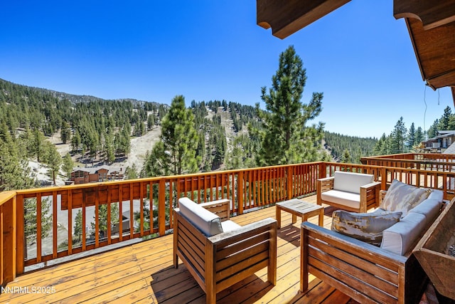 1314 Saint Gallen Ct, Incline Village, NV 89451 - deck with an outdoor living space, a forest view, and a mountain view