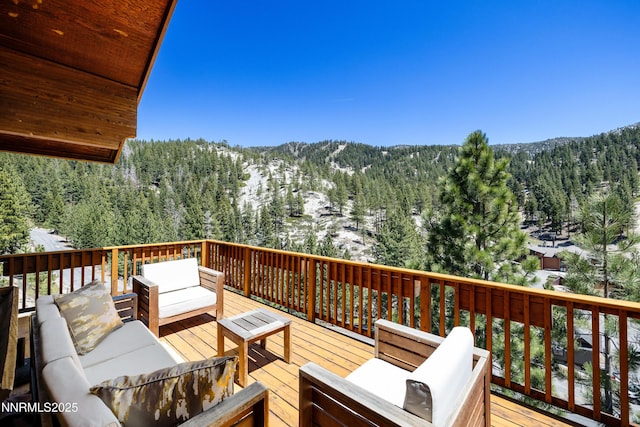 1314 Saint Gallen Ct, Incline Village, NV 89451 - wooden deck with a view of trees, outdoor lounge area, and a mountain view