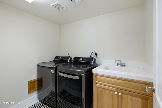 1314 Saint Gallen Ct, Incline Village, NV 89451 - laundry room featuring cabinet space, washing machine and clothes dryer, and baseboards