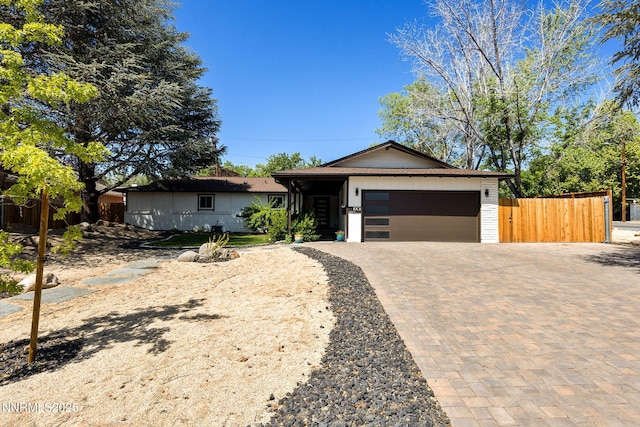 1901 S Marsh Ave, Reno, NV 89509 - ranch-style home featuring an attached garage and decorative driveway