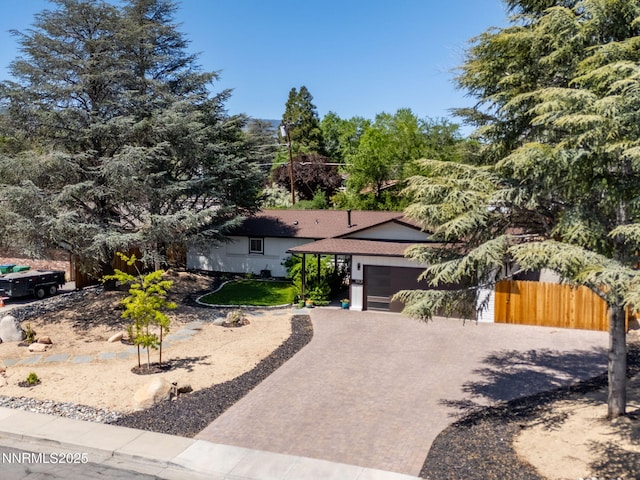 1901 S Marsh Ave, Reno, NV 89509 - view of front of home featuring a garage and decorative driveway