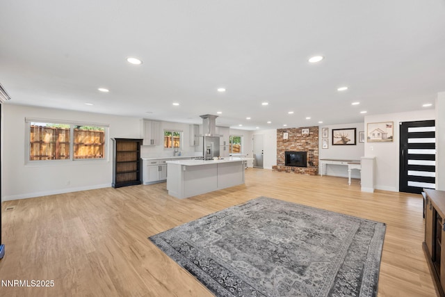 1901 S Marsh Ave, Reno, NV 89509 - living room featuring light wood-style floors, recessed lighting, and baseboards