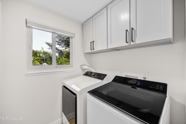 1901 S Marsh Ave, Reno, NV 89509 - laundry area featuring cabinet space and washer and dryer