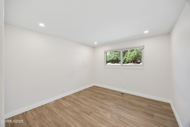 1901 S Marsh Ave, Reno, NV 89509 - empty room featuring baseboards, light wood-style floors, and recessed lighting