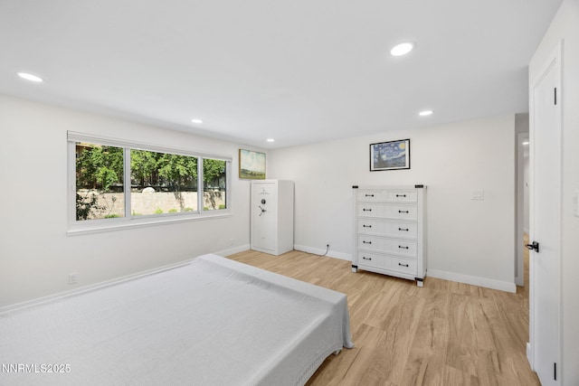 1901 S Marsh Ave, Reno, NV 89509 - bedroom with light wood finished floors, baseboards, and recessed lighting