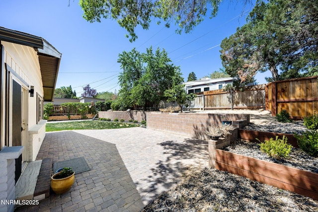 1901 S Marsh Ave, Reno, NV 89509 - fenced backyard featuring a patio