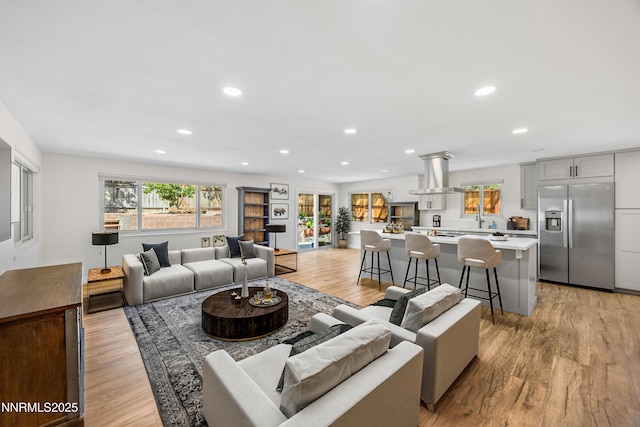 1901 S Marsh Ave, Reno, NV 89509 - living area featuring light wood-style flooring and recessed lighting