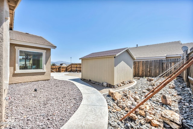 1771 Walnut Dr, Fernley, NV 89408 - fenced backyard with a storage unit