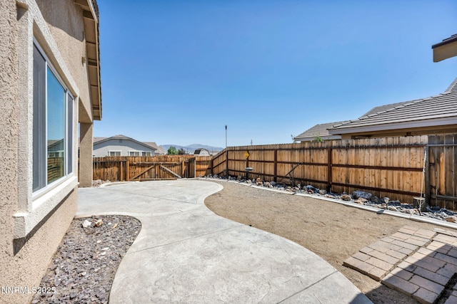 1771 Walnut Dr, Fernley, NV 89408 - fenced backyard featuring a patio
