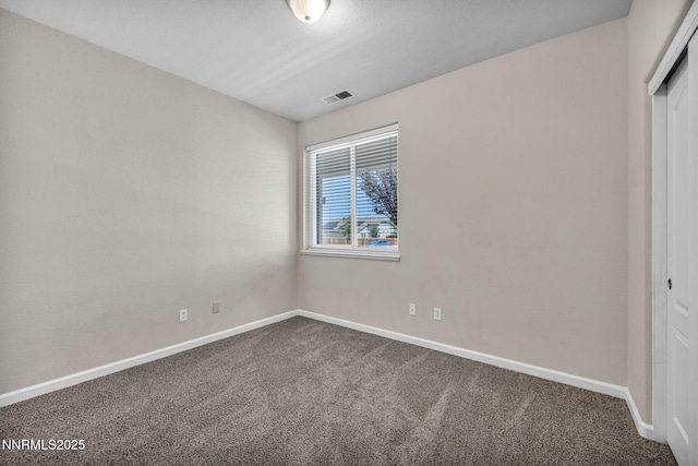 1771 Walnut Dr, Fernley, NV 89408 - unfurnished bedroom with dark carpet and a closet