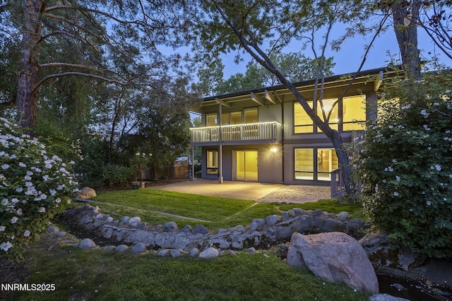 1405 Dartmouth Dr, Reno, NV 89509 - back of house featuring a patio area and a lawn