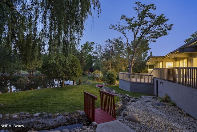 1405 Dartmouth Dr, Reno, NV 89509 - view of grassy yard with a wooden deck