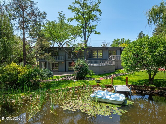 1405 Dartmouth Dr, Reno, NV 89509 - rear view of house featuring a yard