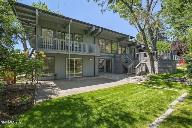 1405 Dartmouth Dr, Reno, NV 89509 - rear view of property featuring a lawn, a patio, stairway, and a deck