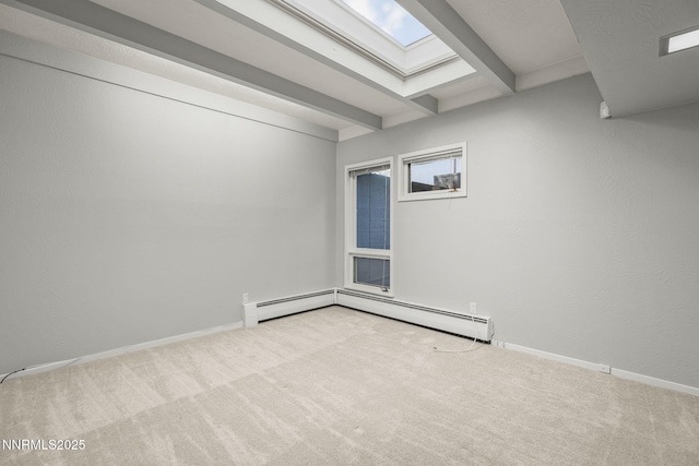1405 Dartmouth Dr, Reno, NV 89509 - carpeted empty room with a skylight, beam ceiling, and baseboards